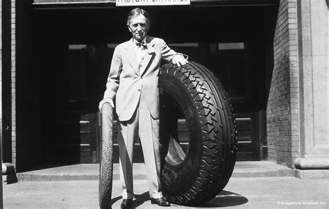 Harvey S. Firestone with tires